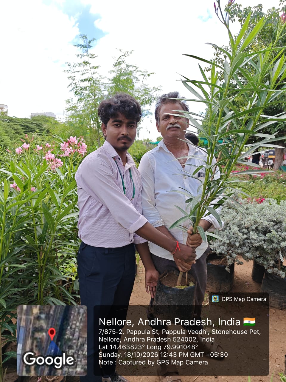 Project participants sharing a young sapling